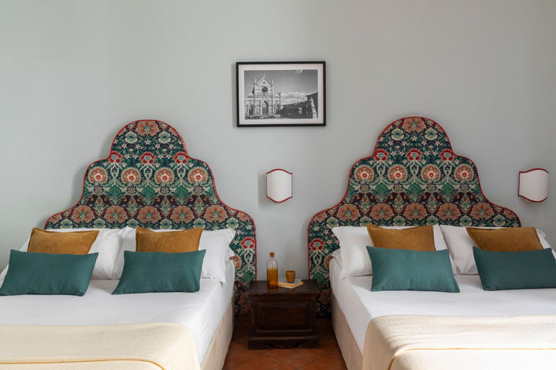 Quadruple room featuring two double beds in the foreground - The Galileo Hotel, BZAR hotels in Florence